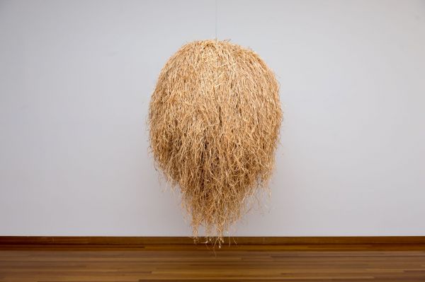 Louise Weaver, Hiding in Plain sight (witch grass nest), 2011-12, polystyrene, epoxy resin, linen, calico, felt, raffia, linen  thread, deconstructed and repurposed cane lasts from  Isamu Noguchi Akari light sculpture, shells, plastic and  room fragrance