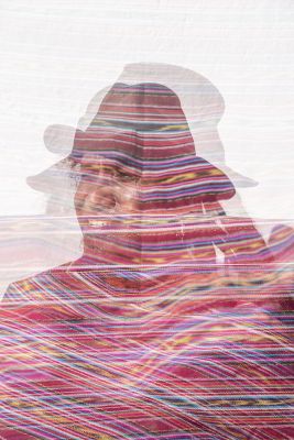 artistically pixellated with pink lines obscures a  figure in a hart